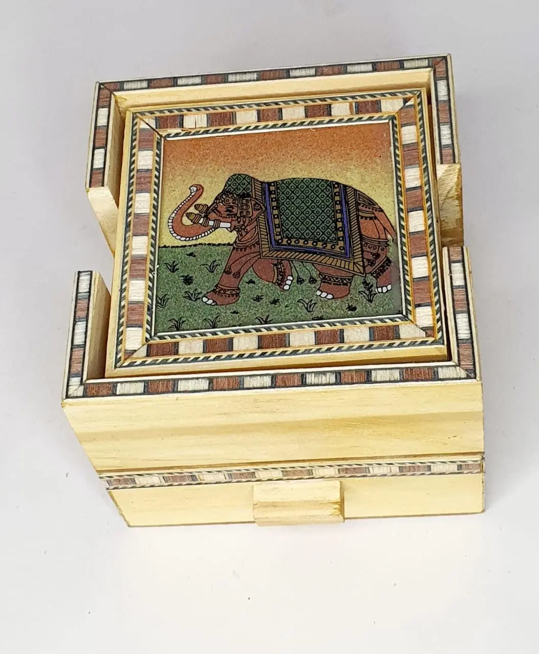 Wooden coffee coster with mini drawer